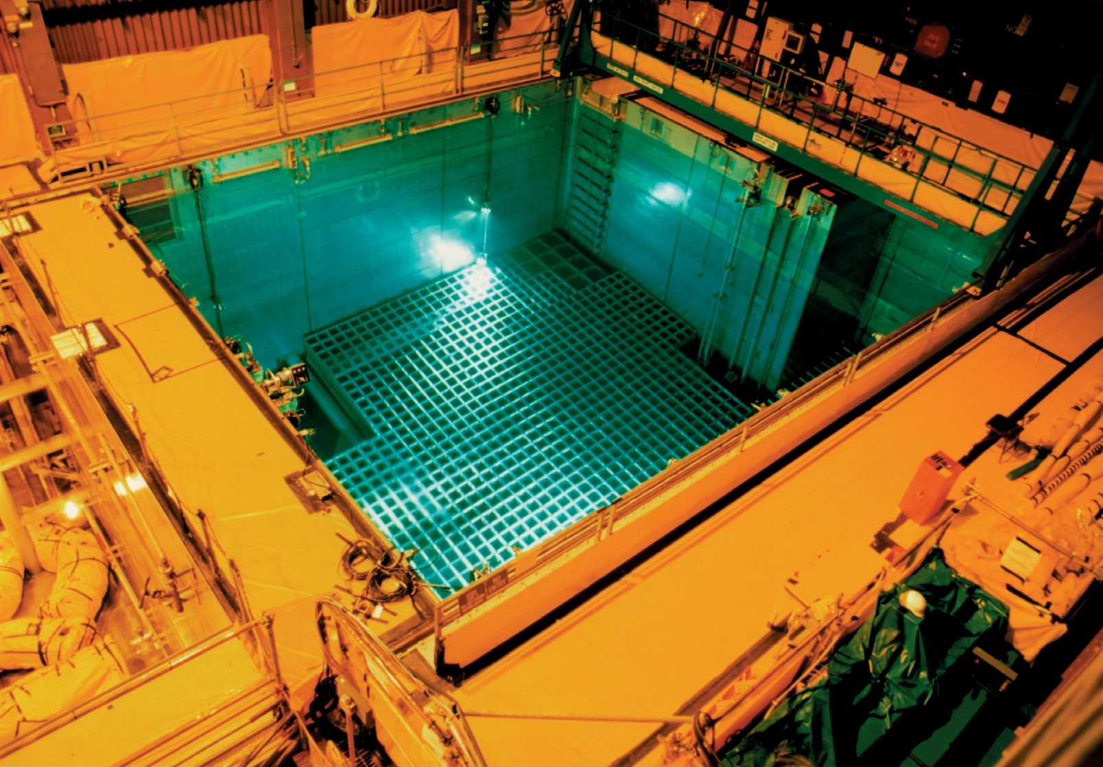 Just Solutions article by Arjun Makhijani featured image of a fuel pool at a nuclear power plant