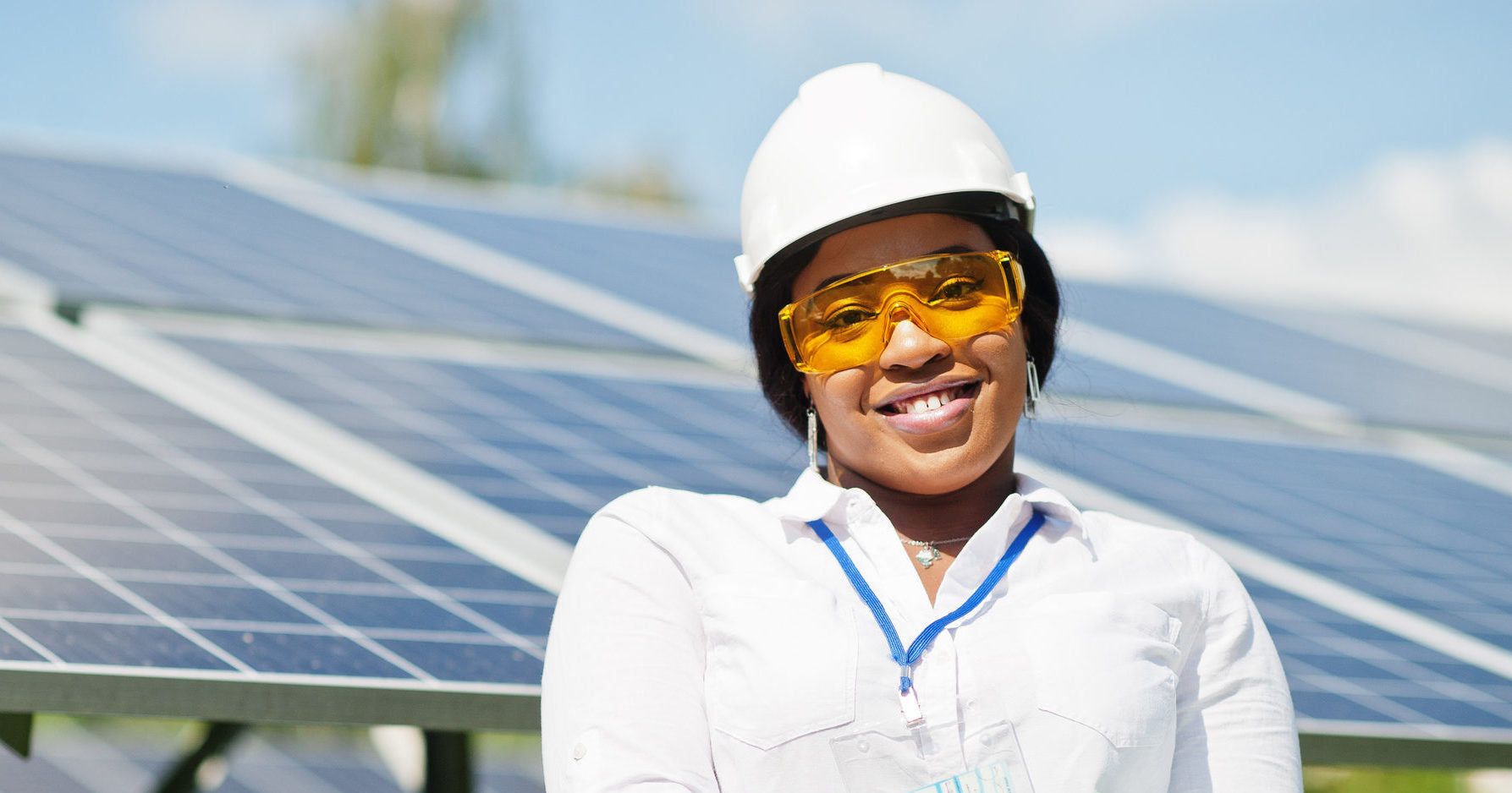 African american technician check the maintenance of the solar panels. Black woman engineer at solar station. stock photo